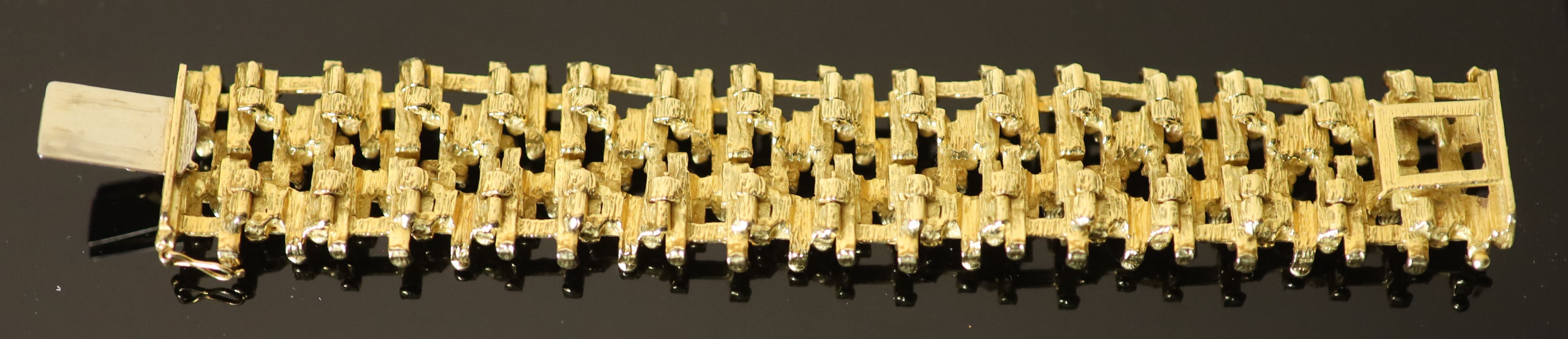 An early 1970s 18ct gold modernist rustic bracelet by Alan Martin Gard,